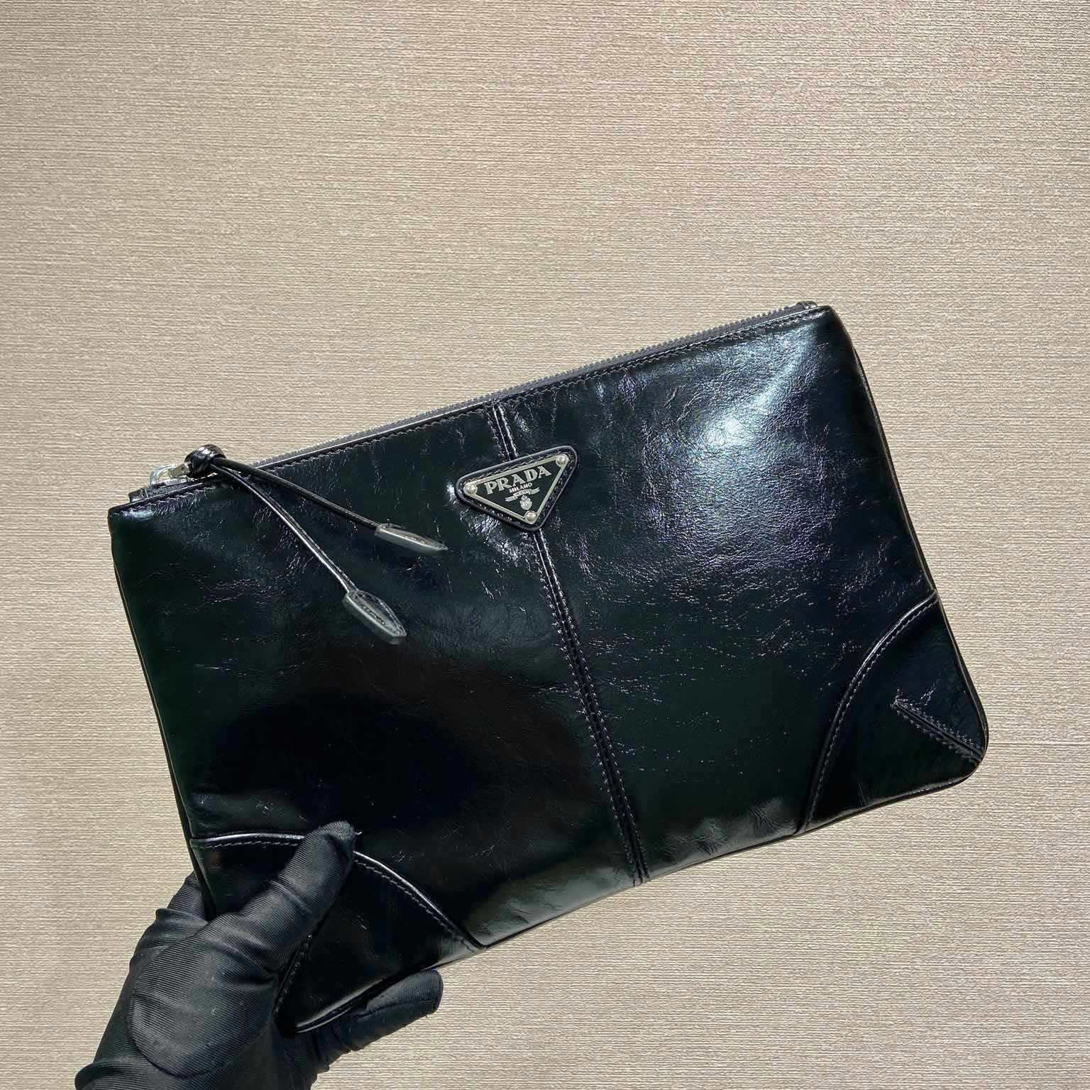 Pra*a clutch bags